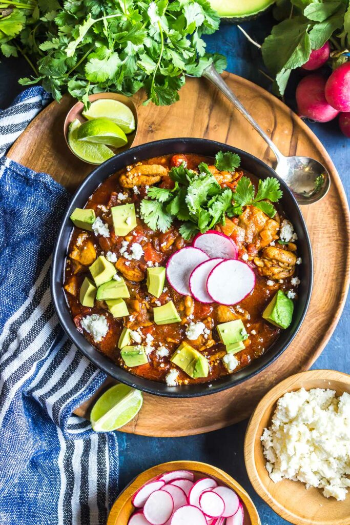 colorful chipotle chicken stew with avocado and cheese colorful chipotle chicken stew with avocado and cheese