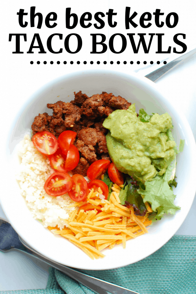 A bowl full of cauliflower rice, ground beef, cheese, lettuce, tomato, and guac - with a text overlay that says keto taco bowls A bowl full of cauliflower rice, ground beef, cheese, lettuce, tomato, and guac - with a text overlay that says keto taco bowls
