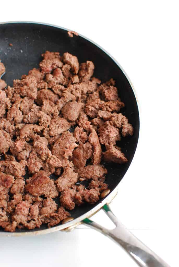 browned ground beef in a skillet browned ground beef in a skillet
