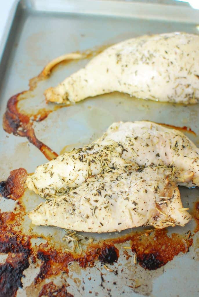 keto roasted chicken breast with a delicious italian marinade on a baking sheet keto roasted chicken breast with a delicious italian marinade on a baking sheet