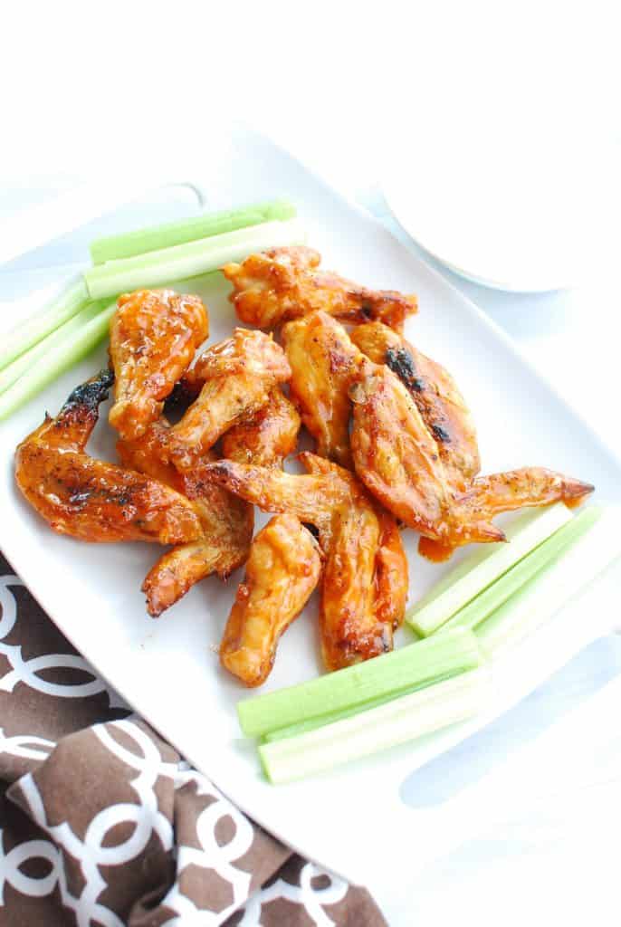 Crispy keto chicken wings on a white platter Crispy keto chicken wings on a white platter
