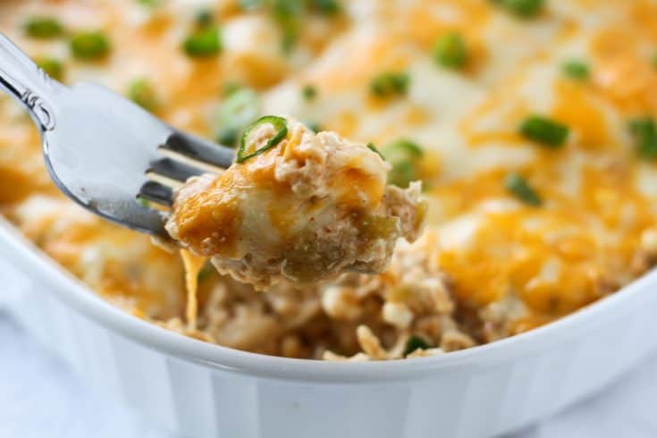 a fork full of green chile chicken casserole a fork full of green chile chicken casserole