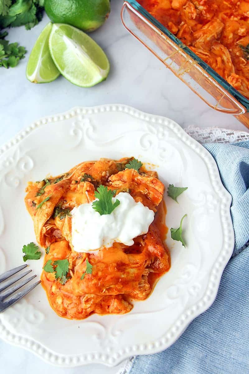 keto chicken enchilada casserole with a dollop of sour cream keto chicken enchilada casserole with a dollop of sour cream