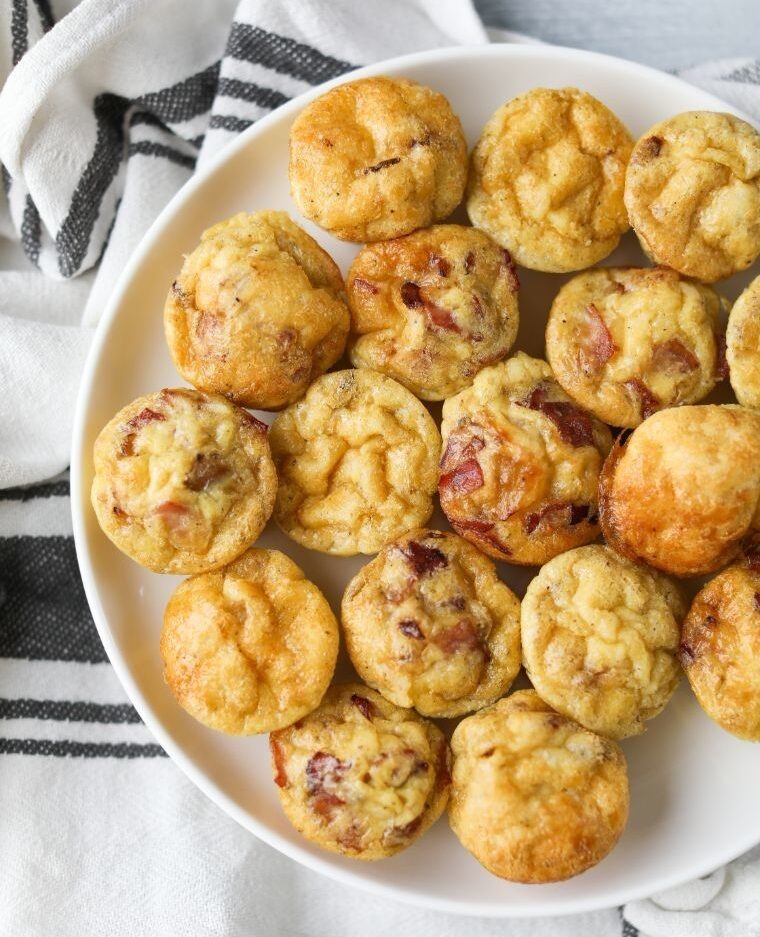 a bunch of low carb egg bites on a plate a bunch of low carb egg bites on a plate
