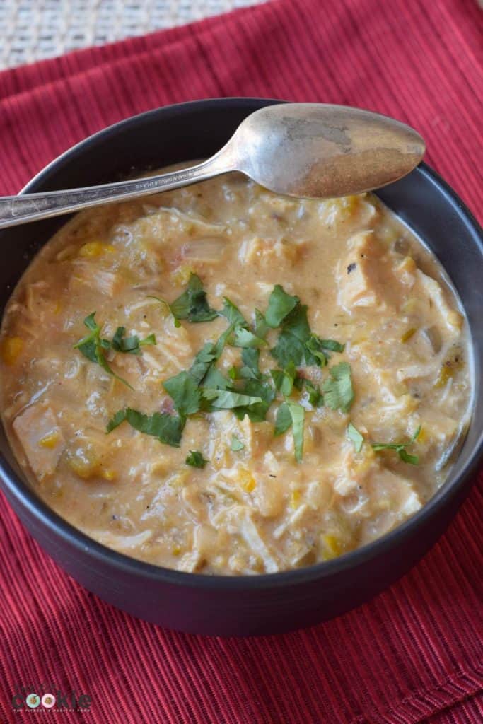 slow cooker keto chicken chili in a blue bowl slow cooker keto chicken chili in a blue bowl