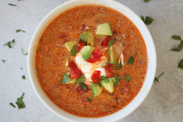 slow cooker keto taco soup in white bowl topped with avocado slow cooker keto taco soup in white bowl topped with avocado