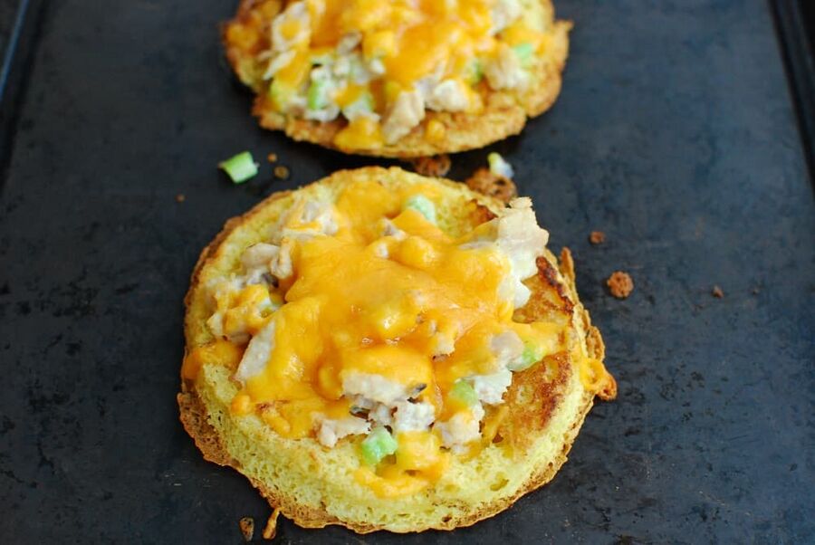 one half of a low carb tuna melt that's just been baked on a baking sheet one half of a low carb tuna melt that's just been baked on a baking sheet