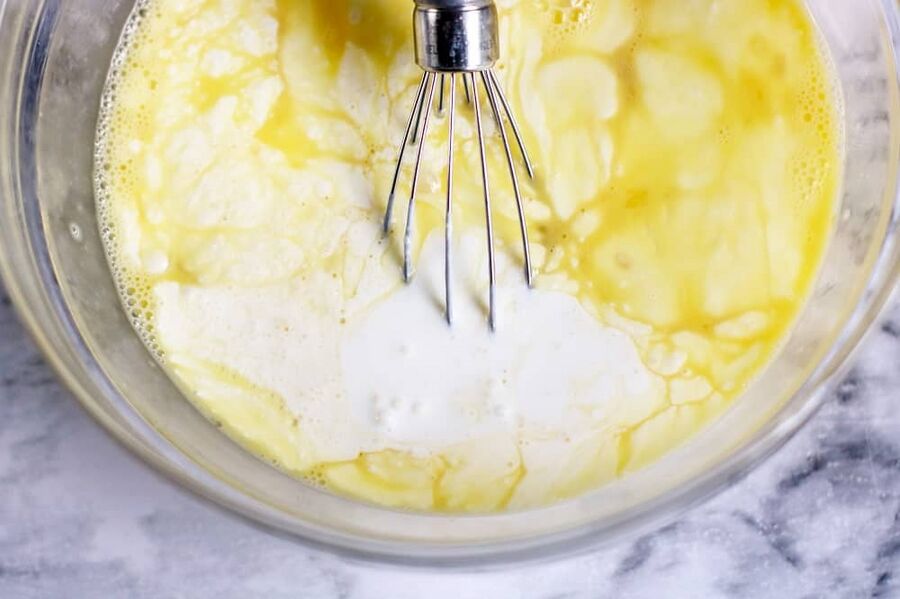 Eggs and heavy cream mixed together in a bowl Eggs and heavy cream mixed together in a bowl
