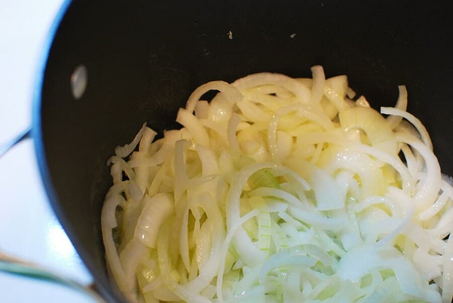 Onions at the start of cooking in a pot Onions at the start of cooking in a pot
