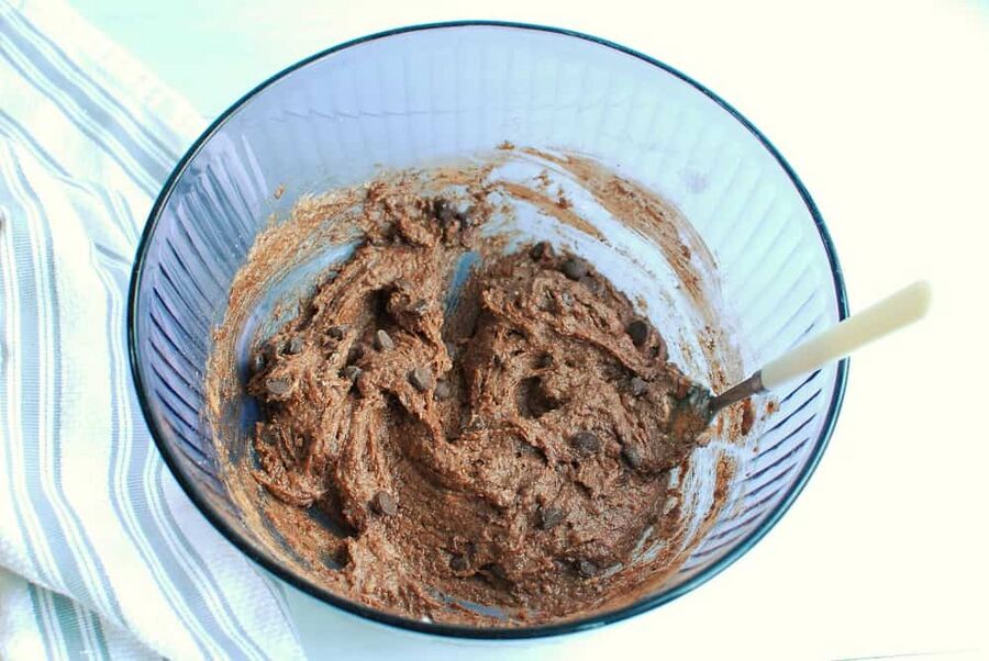 keto brownie batter in a large purple bowl keto brownie batter in a large purple bowl