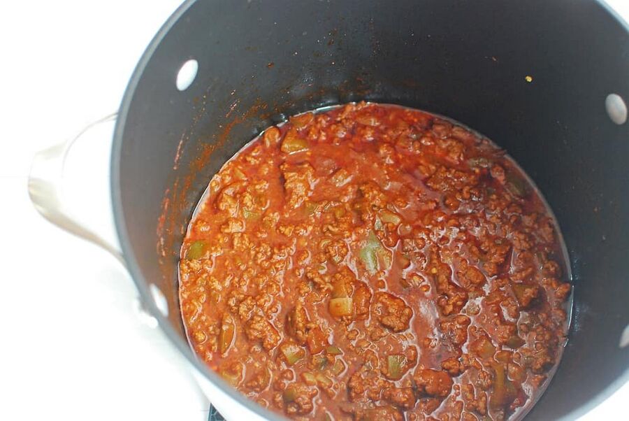 A pot full of simmering keto chili A pot full of simmering keto chili