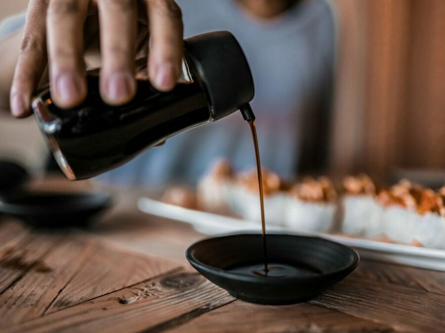 Soy Sauce being poured into a bowl Soy Sauce being poured into a bowl