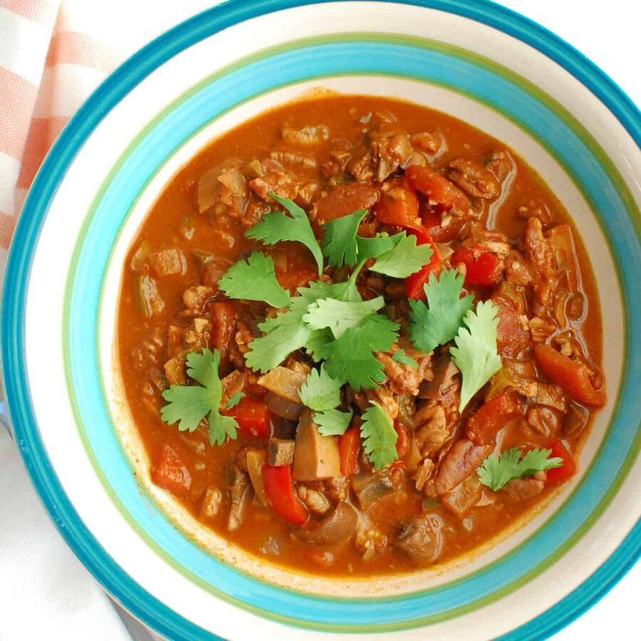 A blue and white bowl filled with keto vegan chili. A blue and white bowl filled with keto vegan chili.