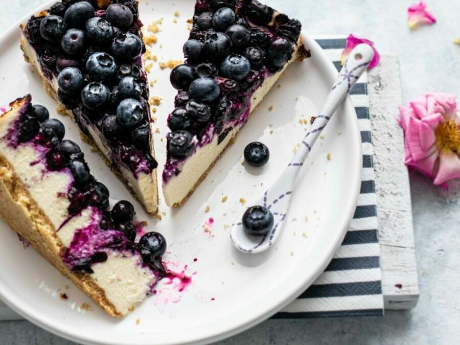 Keto Cheesecake Recipe cut into slices on a plate - keto dessert idea Keto Cheesecake Recipe cut into slices on a plate - keto dessert idea