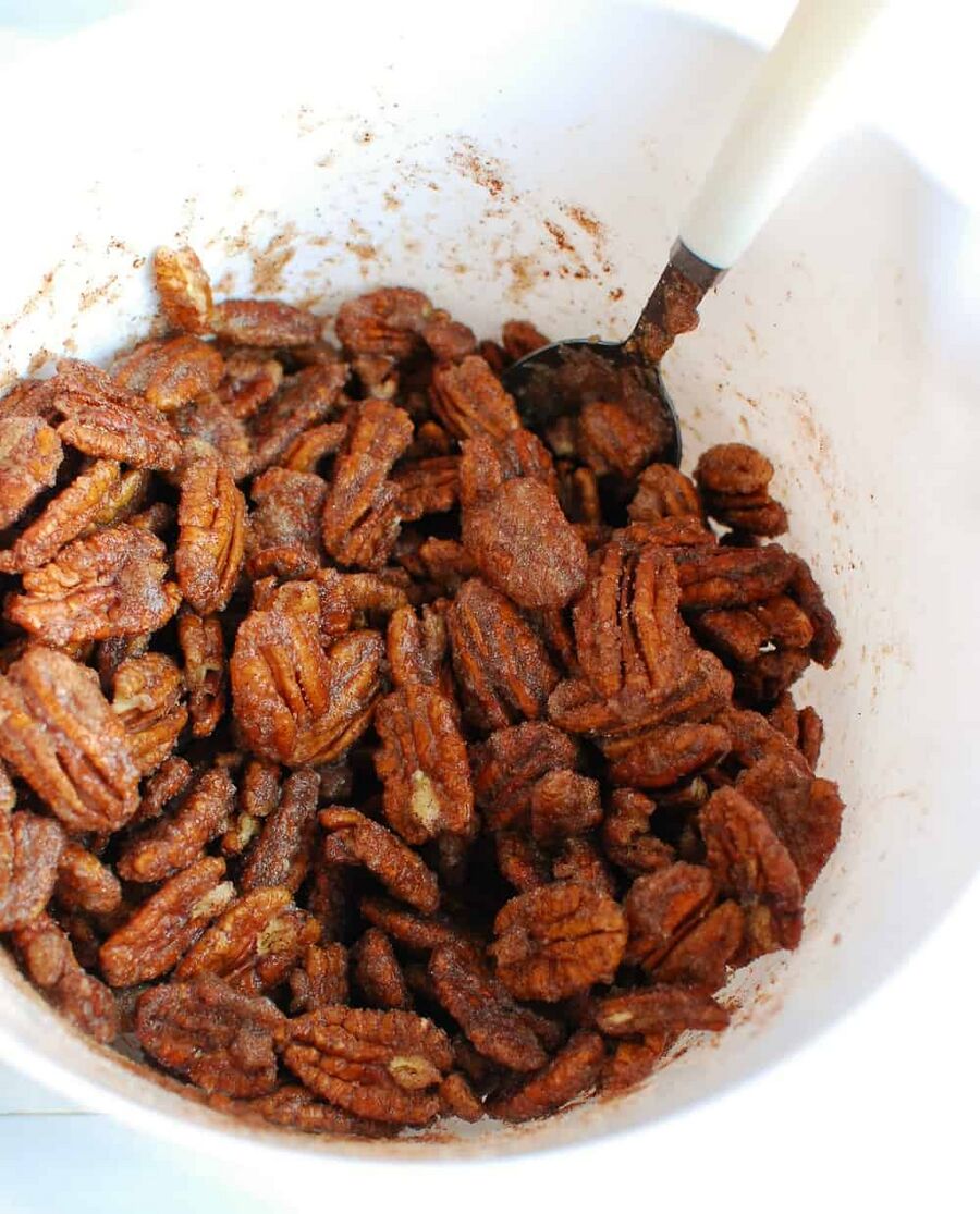 Pecans tossed in cinnamon sweetener mix Pecans tossed in cinnamon sweetener mix
