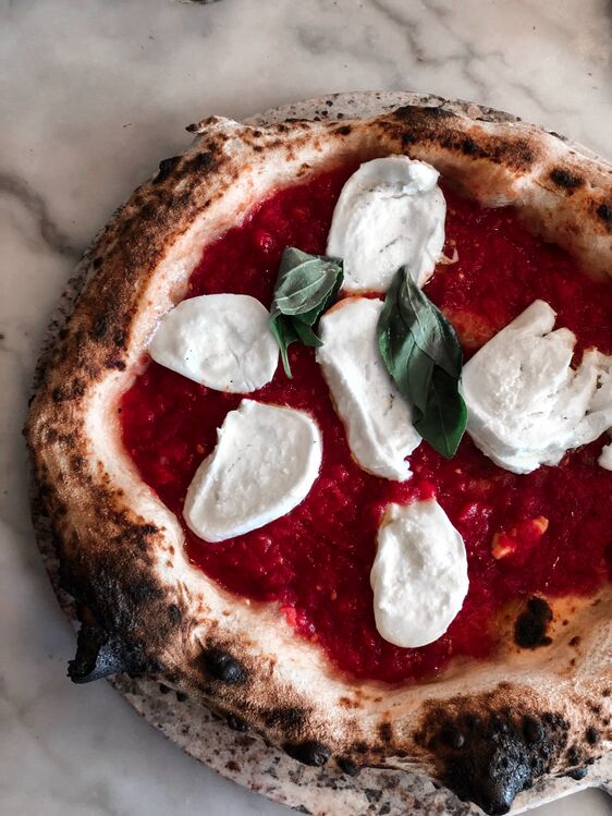 keto marinara sauce on a keto pizza base - Yummy Keto Cooking